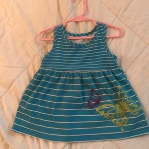 Girls top with artwork on bottom